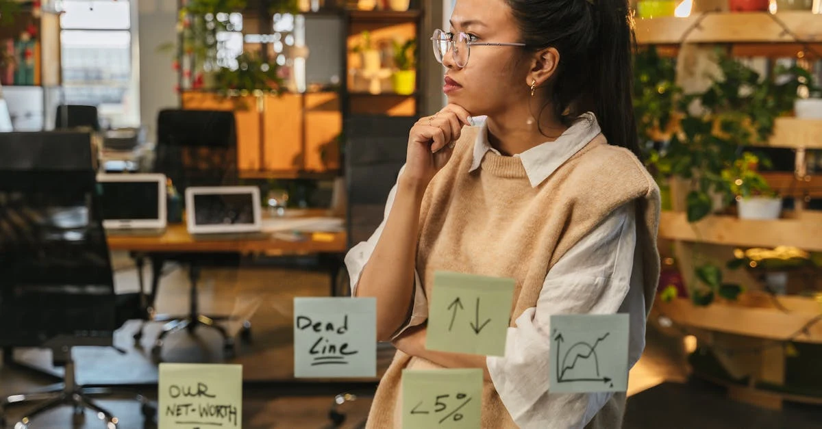 Woman thoughtfully analyzing sticky notes in office, representing human judgment in ai for executive assistants roles.