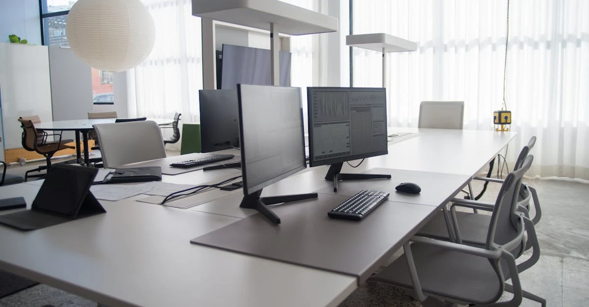 Modern office workspace with dual monitors, ergonomic seating, and natural lighting for AI-powered executive assistant tools.